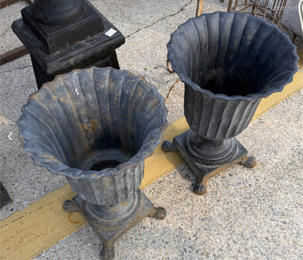 Small Pair of cast iron urns - fluted w/paw feet