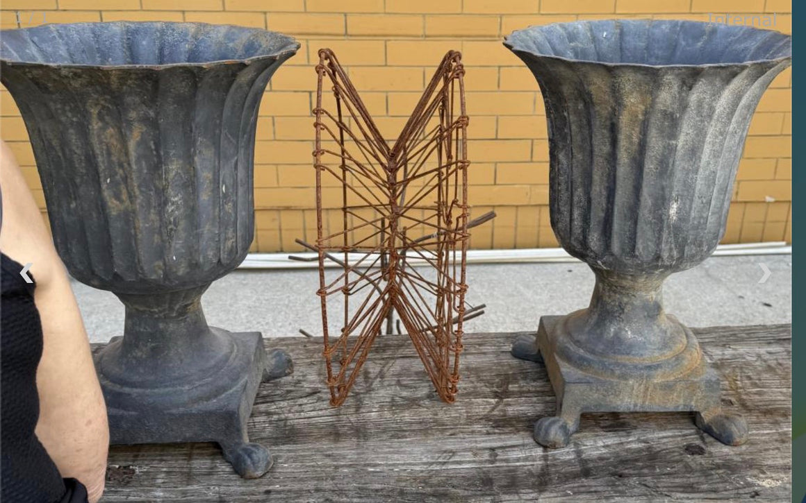 Small Pair of cast iron urns - fluted w/paw feet